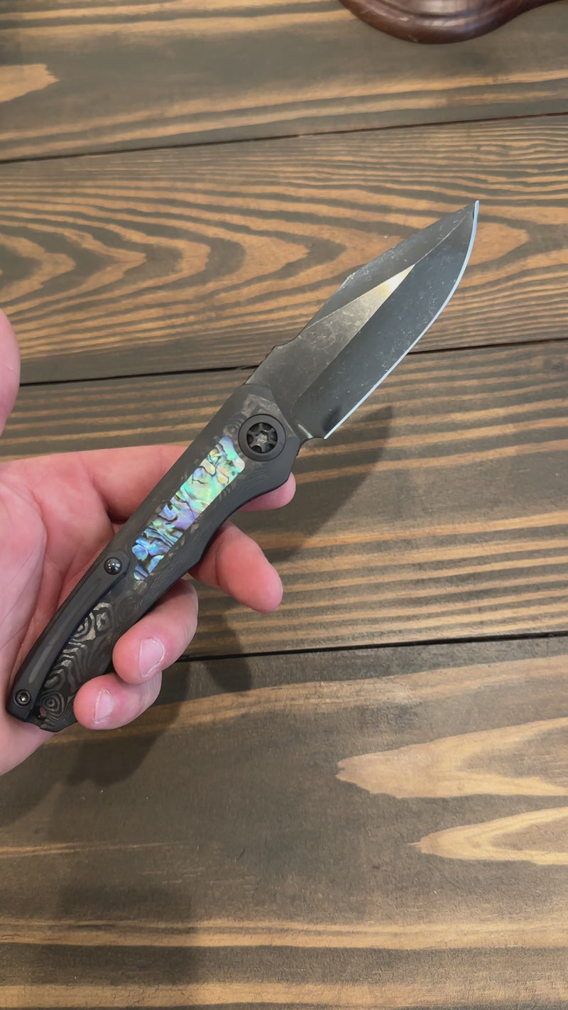 Load and play video in Gallery viewer, Heretic Knives Custom Auto Wraith with Abalone Inlay
