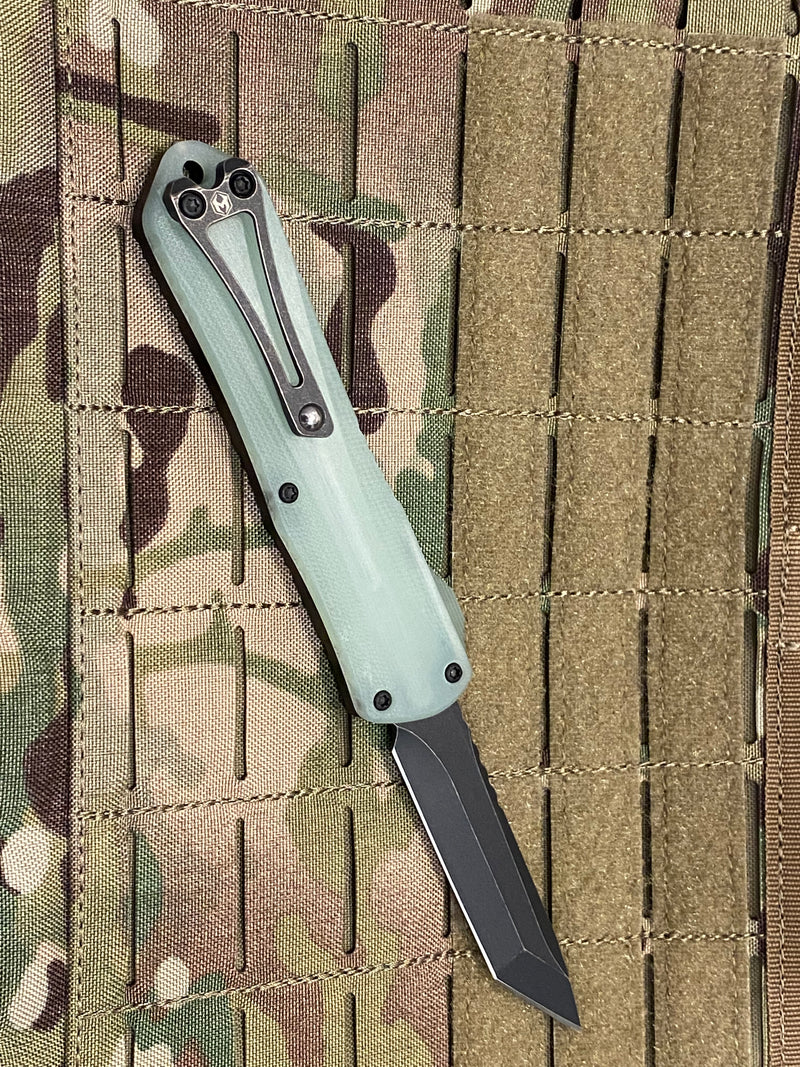 Load image into Gallery viewer, HERETIC MANTICORE-E OTF AUTO TANTO EDGE WITH JADE GREEN G-10 BACKCOVER WITH BLACK BATTLEWORN BLADE
