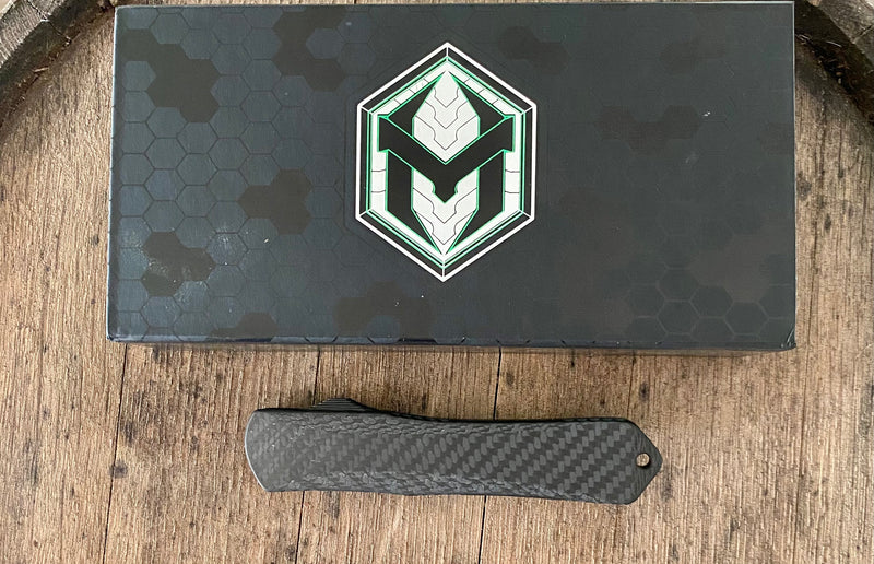 Load image into Gallery viewer, Heretic Knives manticore X hand ground stonewashed dlc blade with carbon fiber &amp; flamed Titanium chassis S/N:016
