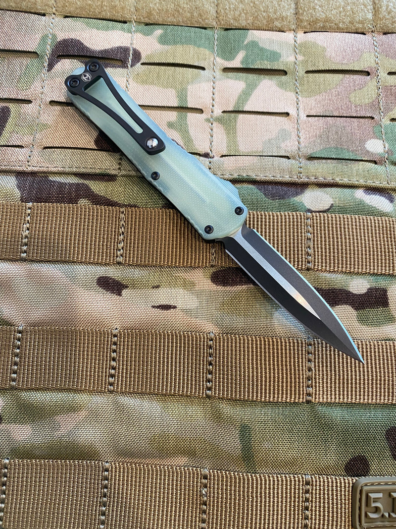Load image into Gallery viewer, HERETIC MANTICORE-S OTF AUTO DOUBLE EDGE JADE G-10 CHASSIS BOTTOM WITH TWO TONE BLACK BLADE
