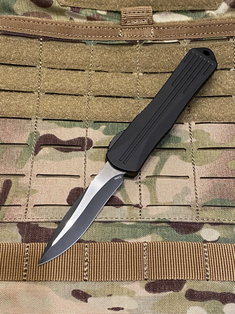 Load image into Gallery viewer, Heretic Knives Manticore-E Recurve Tactical Black DLC Elmax Fluted OTF Automatic
