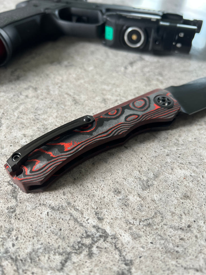 Load image into Gallery viewer, Heretic Knives Auto Wraith Orange Camo Carbon
