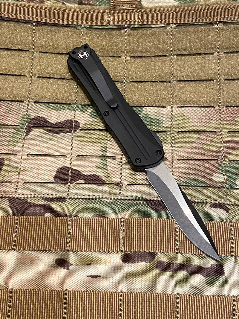 Load image into Gallery viewer, Heretic Knives Manticore-E Recurve Tactical Black DLC Elmax Fluted OTF Automatic
